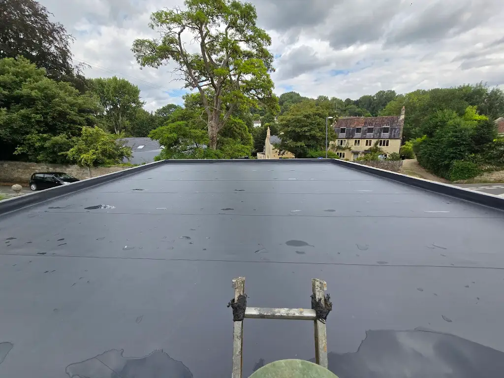 Flat roof installation by Roman City Construction